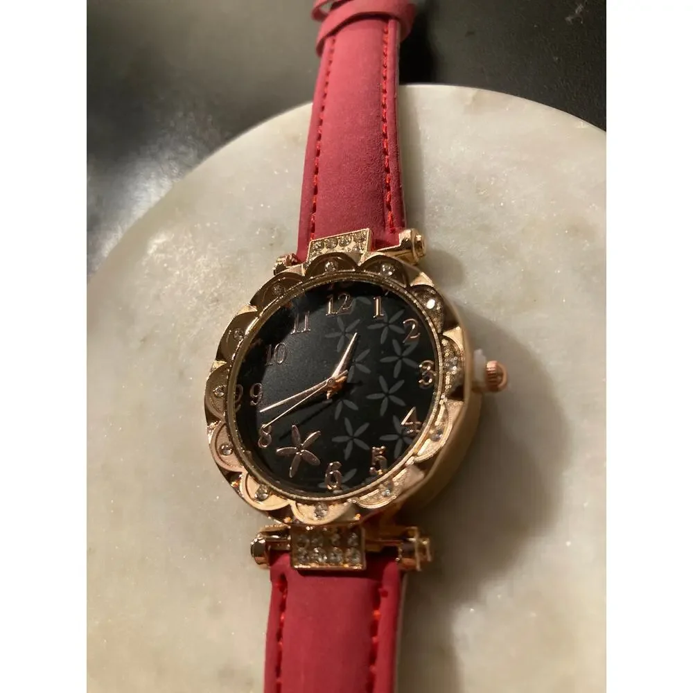 Women’s wrist watch red band golden , bling detail